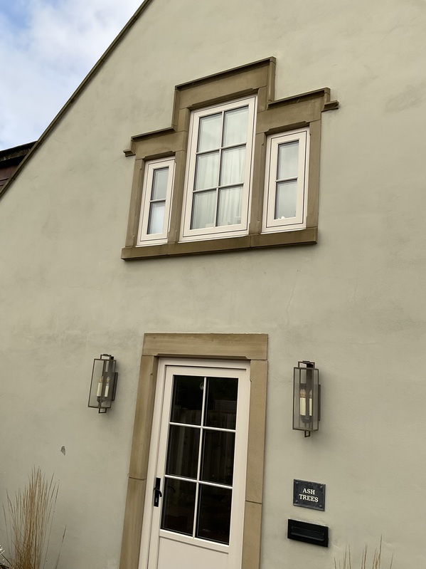 feature window with hood moulding